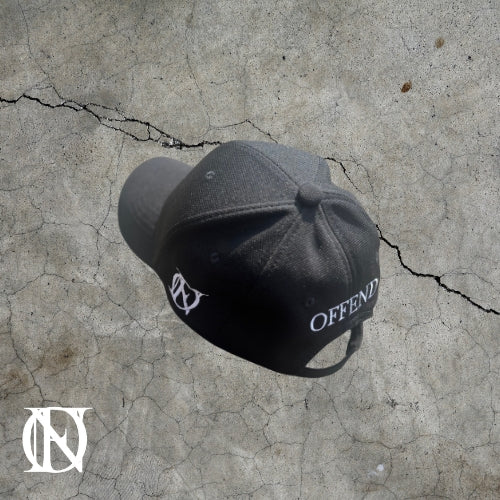 Black baseball cap with the OFFEND logo and OFFEND text