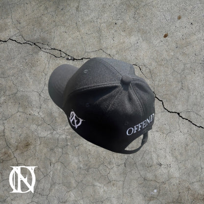 Black baseball cap with the OFFEND logo and OFFEND text