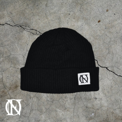 Black beanie with OFFEND logo