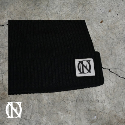 Black beanie with OFFEND logo