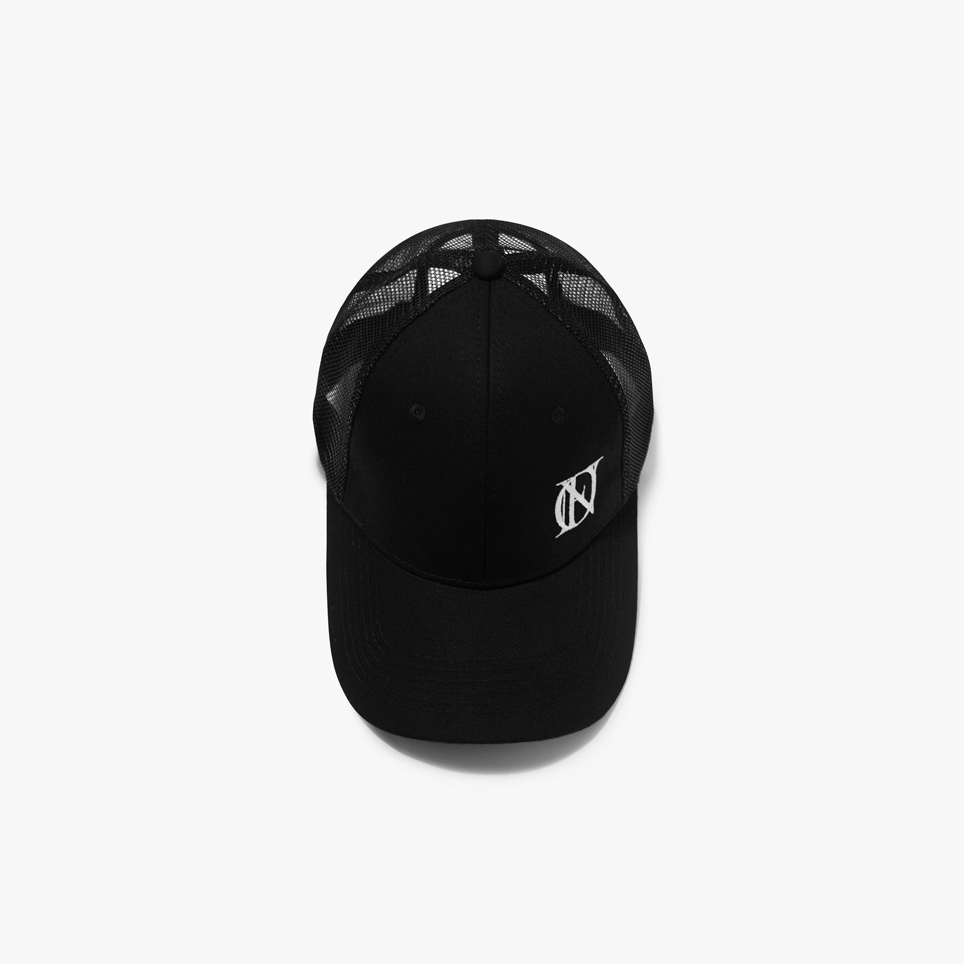 Top view of the 'OFFEND' mesh trucker cap with the 'OFFEND' logo on the front right hand side