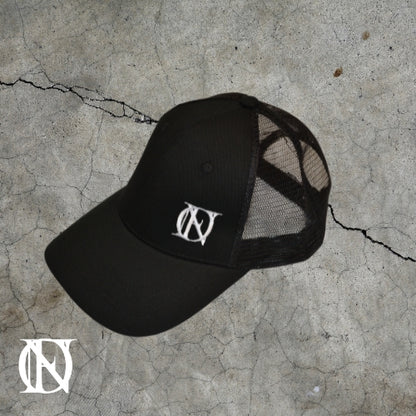 Black trucker cap with the OFFEND logo