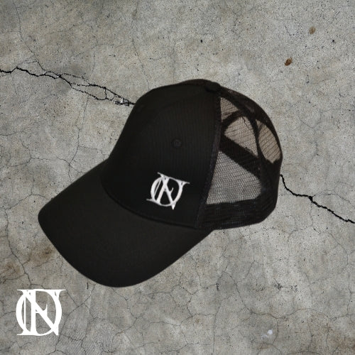 Black trucker cap with the OFFEND logo