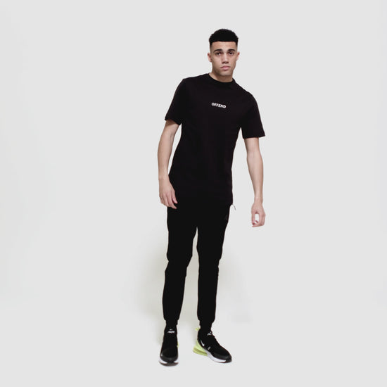 Model wearing 0G 'OFFEND' black T-Shirt moving around showcasing the front and back of the T-shirt as well as close up shots on a white background