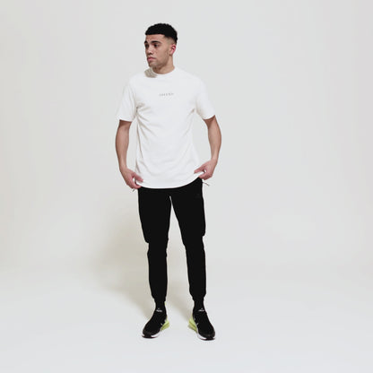 Model wearing 0G 'OFFEND' white T-Shirt moving around showcasing the front and back of the T-shirt as well as close up shots on a white background